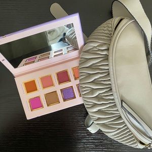 Grey fanny pack with Alamar Cosmetics Sp